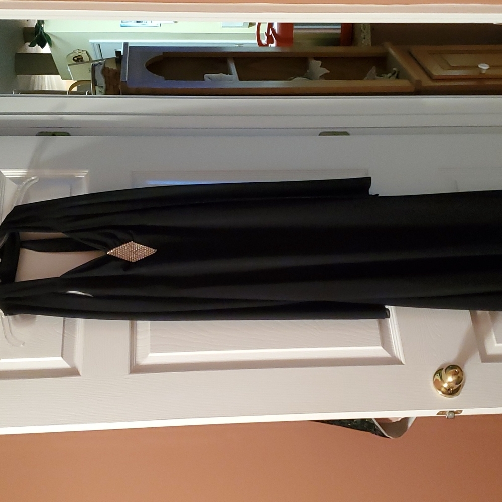 Beautiful full length black dress. Gorgeous touches throughout.